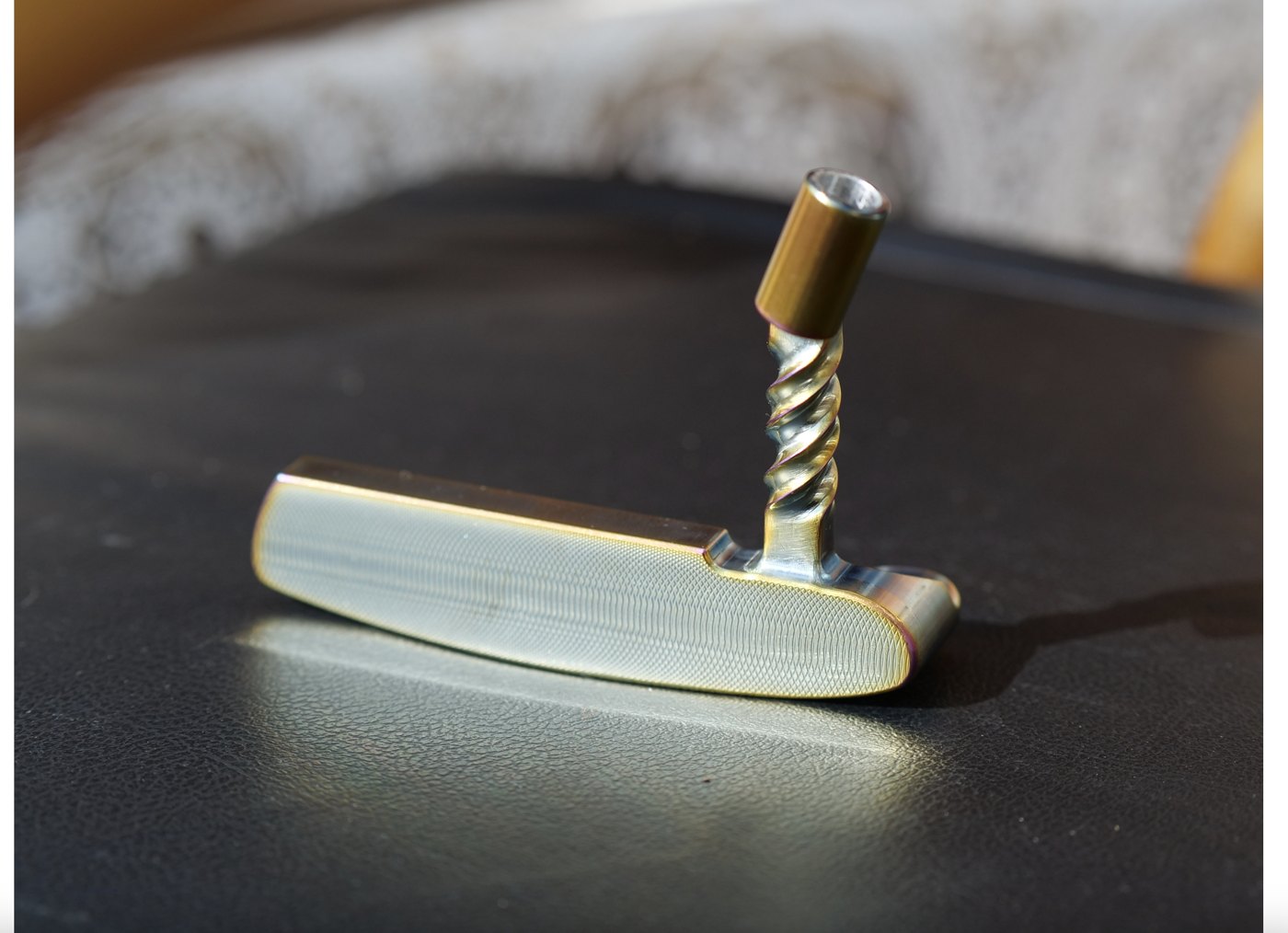 SAKAKI Gear putter with an intricately machined twist neck